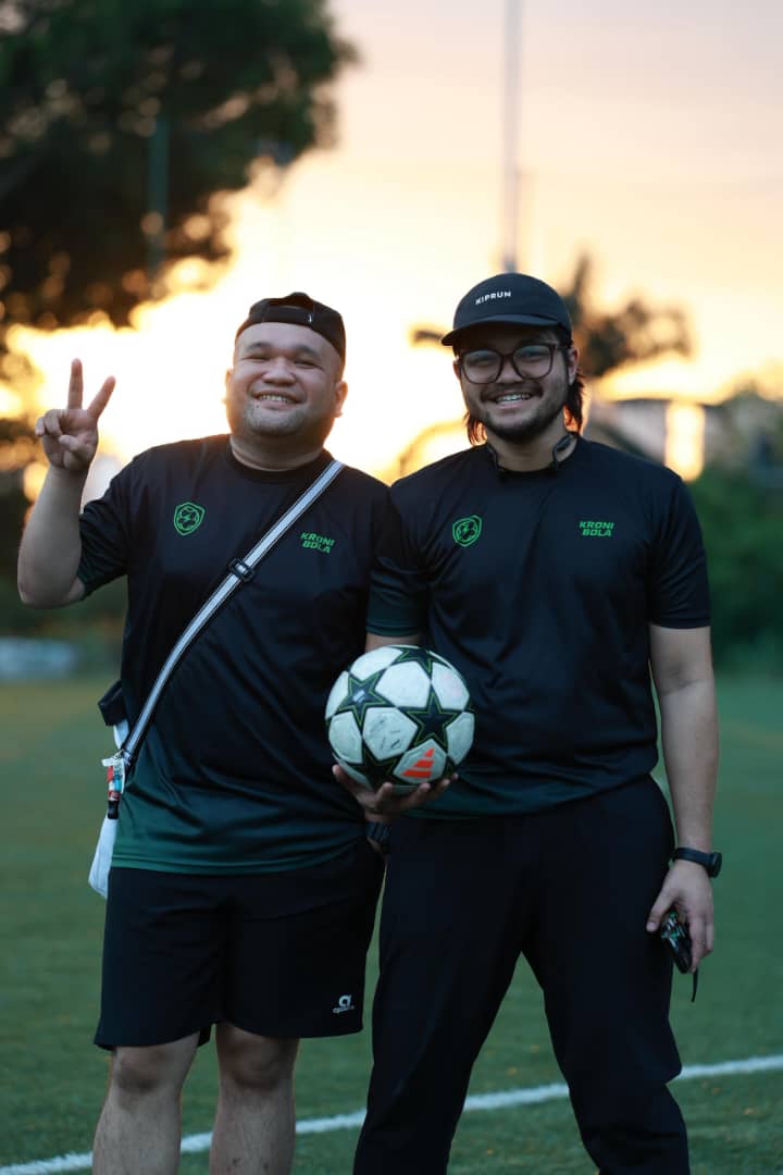 KroniBola admins wearing the jersey